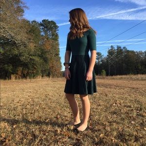 Green knee-length dress